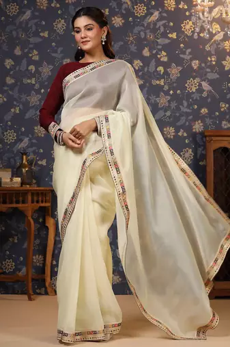 Cream sequinned embellished saree