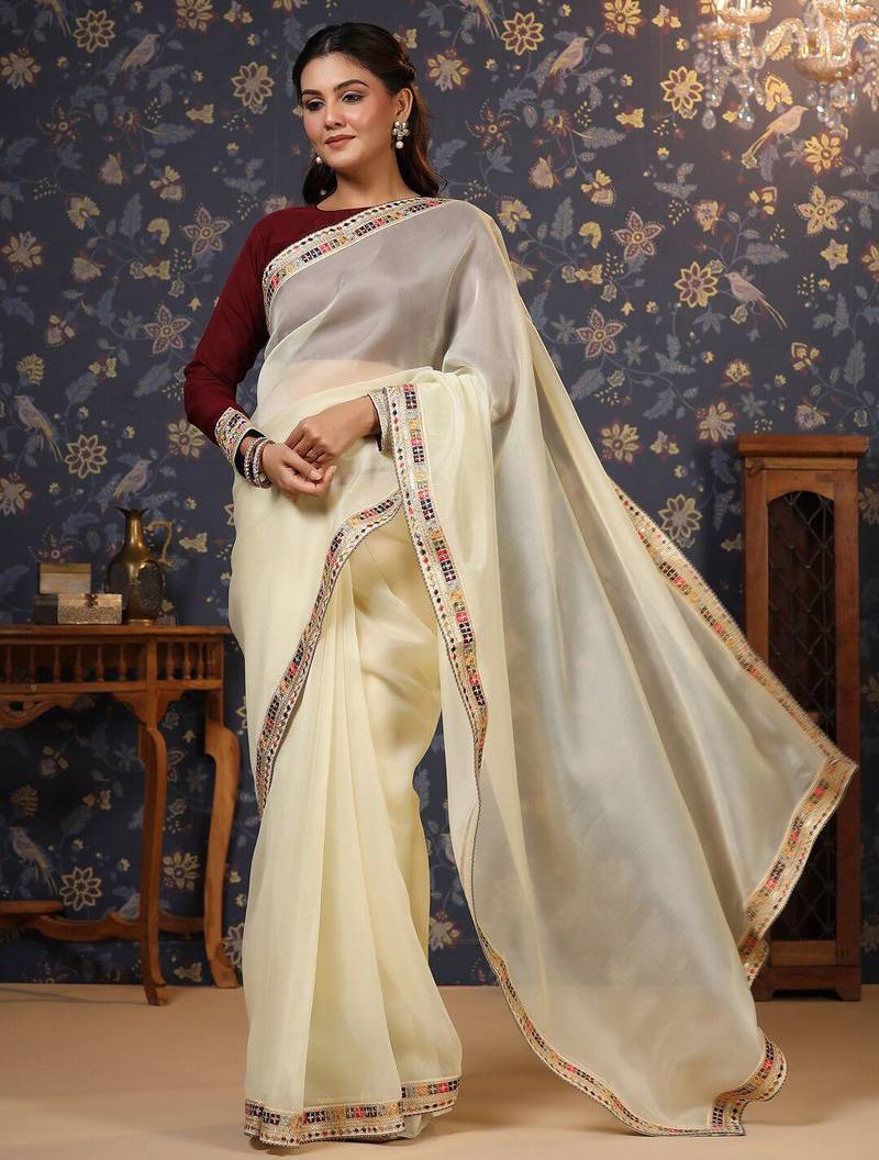 Cream sequinned embellished saree