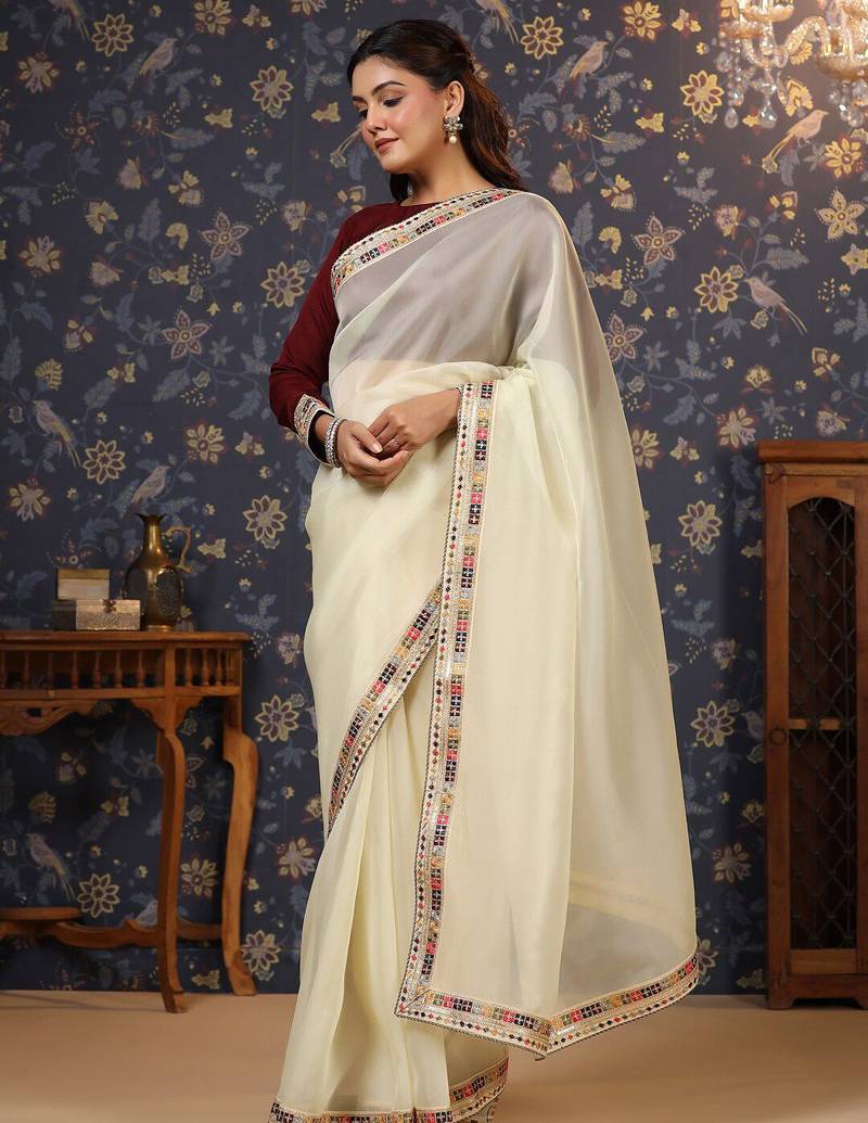 Cream sequinned embellished saree