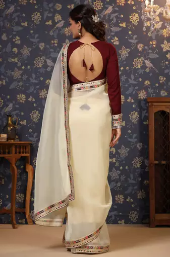 Cream sequinned embellished saree