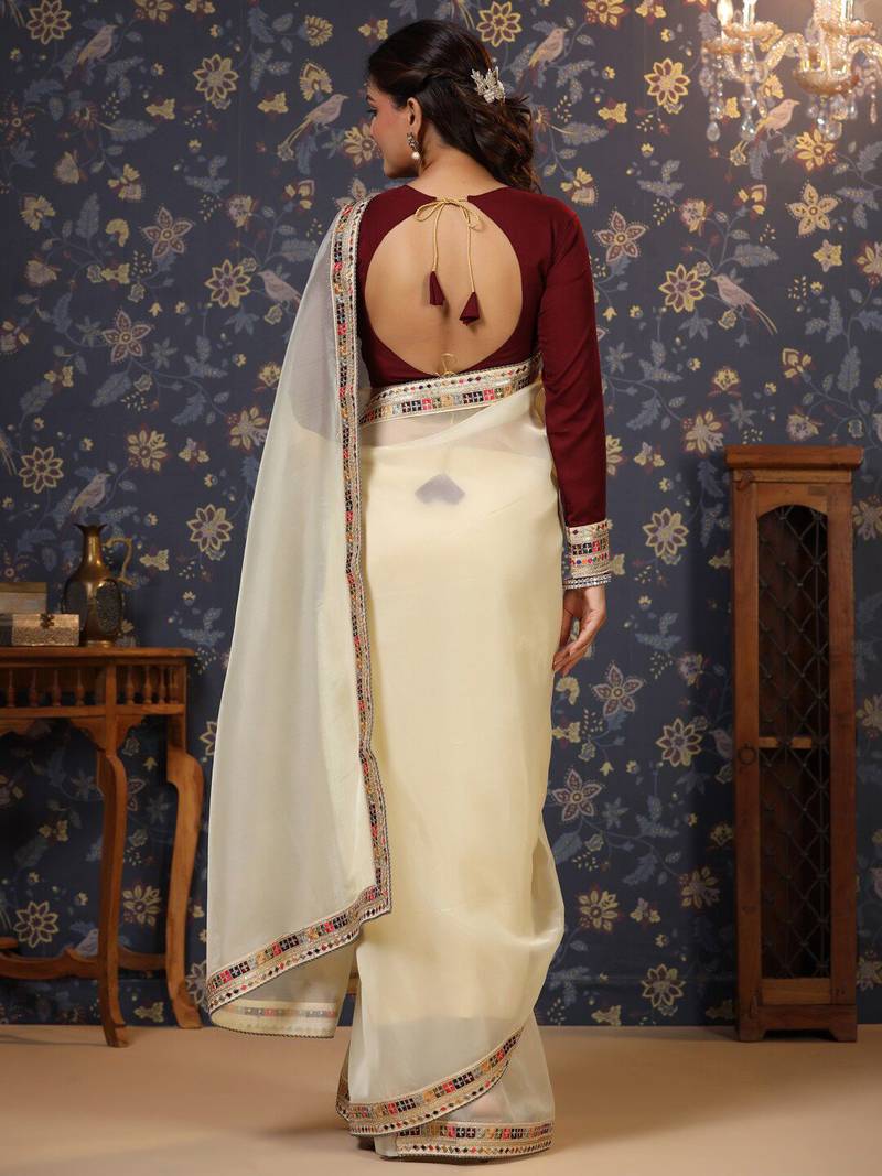 Cream sequinned embellished saree