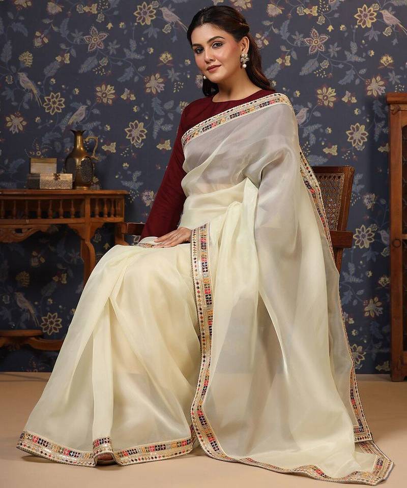 Cream sequinned embellished saree