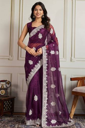 Magenta ethnic motifs embroidered net saree