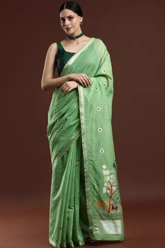 Green woven design muga saree with blouse