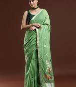 Green woven design muga saree with blouse