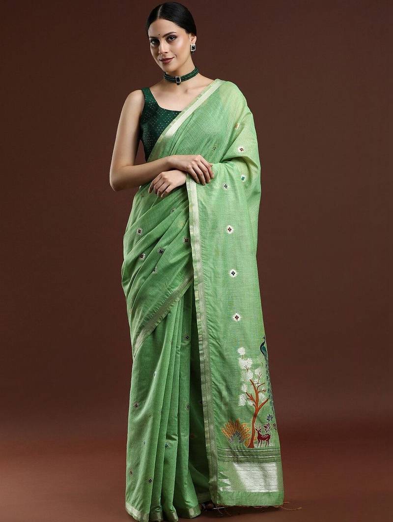 Green woven design muga saree with blouse