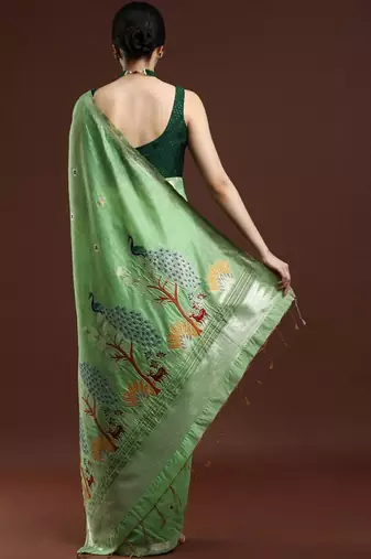 Green woven design muga saree with blouse