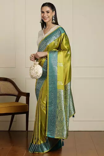 Green ethnic motifs zari banarasi saree