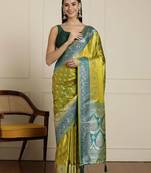Green woven design banarasi saree with unstitched blouse