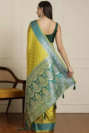 Green woven design banarasi saree with unstitched blouse