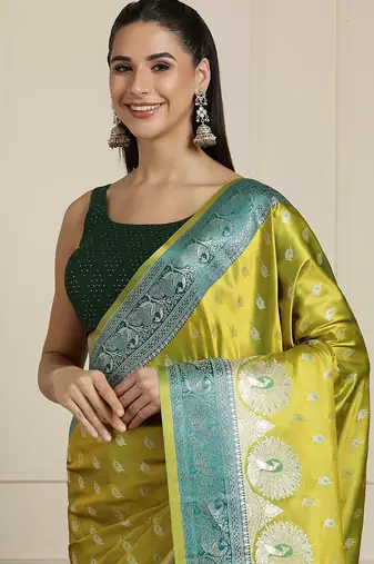 Green woven design banarasi saree with unstitched blouse