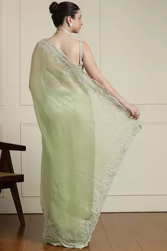 Green woven design floral saree with blouse