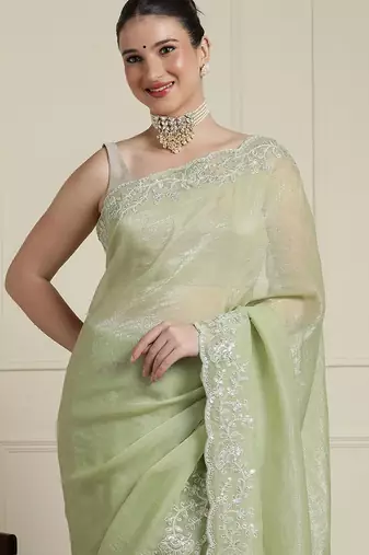 Green woven design floral saree with blouse