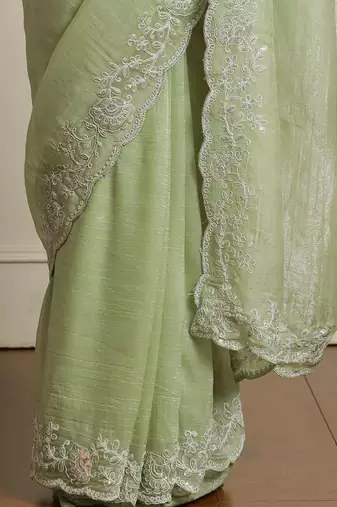 Green woven design floral saree with blouse