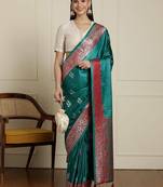 Sea green ethnic motifs woven design banarasi saree