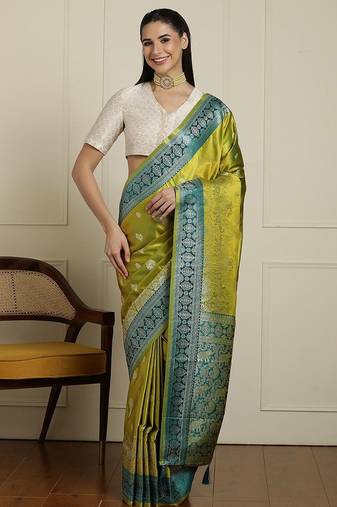 Green woven design banarasi saree with blouse piece