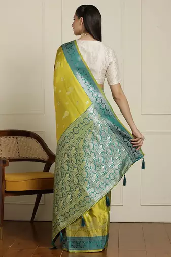 Green woven design banarasi saree with blouse piece