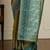 Green woven design banarasi saree with blouse piece
