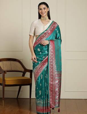 Sea green ethnic motifs zari woven design banarasi saree with blouse piece 1