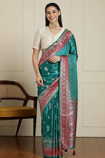 Sea green ethnic motifs zari woven design banarasi saree with blouse piece