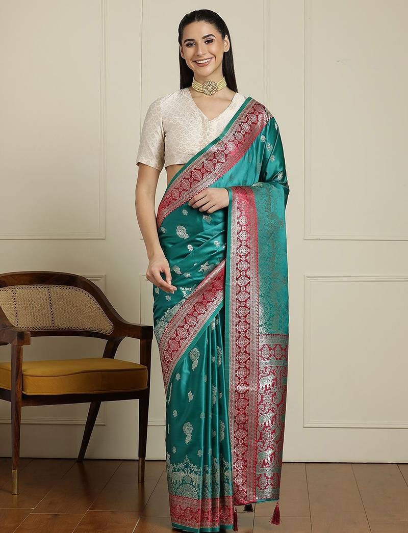 Sea green ethnic motifs zari woven design banarasi saree with blouse piece