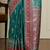 Sea green ethnic motifs zari woven design banarasi saree with blouse piece