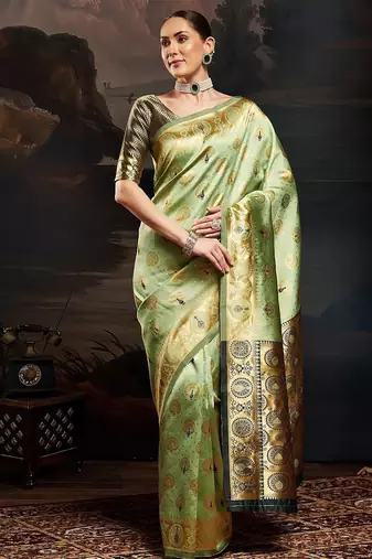 Green woven design kanjeevaram saree with matching blouse