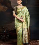 Green woven design kanjeevaram saree with matching blouse