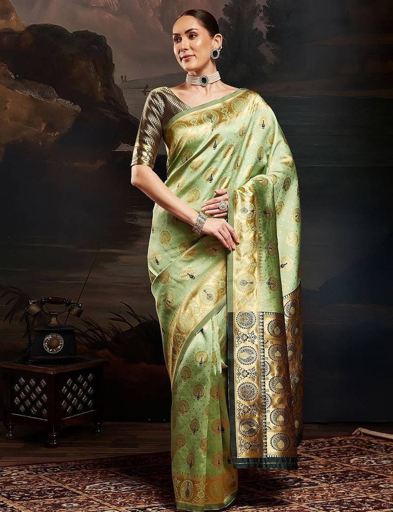 Green woven design kanjeevaram saree with matching blouse