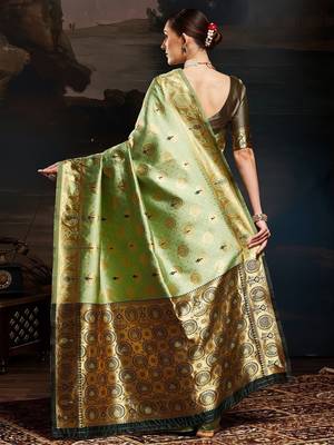 Green woven design kanjeevaram saree with matching blouse 2