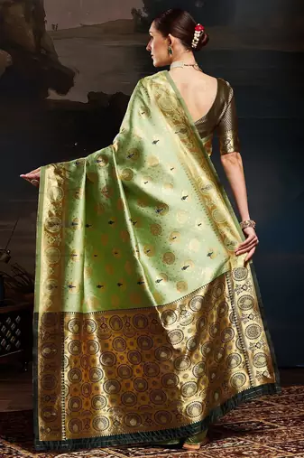 Green woven design kanjeevaram saree with matching blouse
