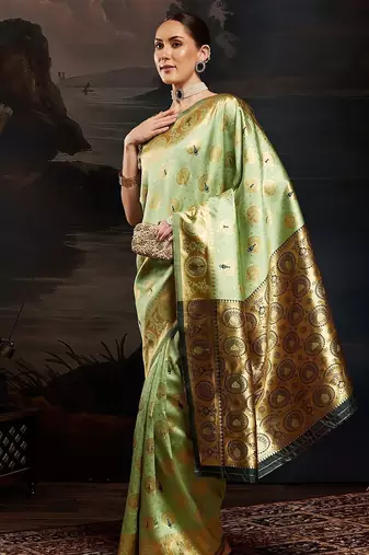 Green woven design kanjeevaram saree with matching blouse