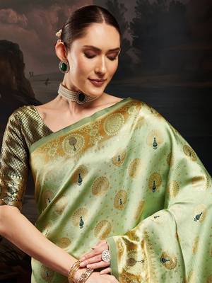 Green woven design kanjeevaram saree with matching blouse 4