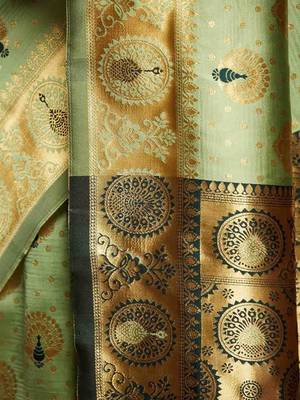 Green woven design kanjeevaram saree with matching blouse 5
