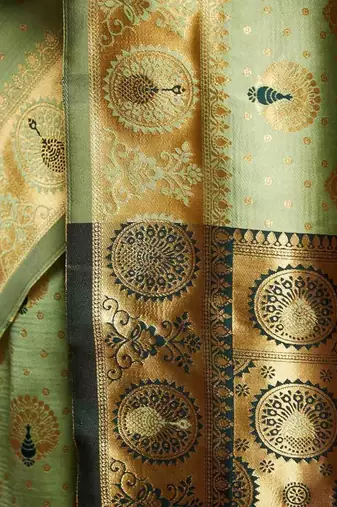 Green woven design kanjeevaram saree with matching blouse