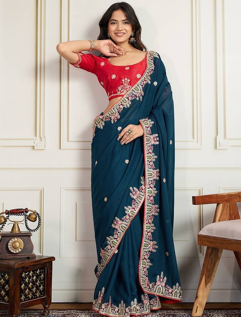 Teal floral embroidered saree with unstitched blouse