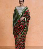 Red woven design saree with blouse
