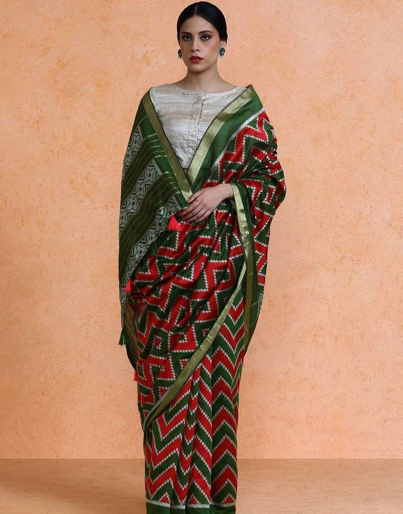 Red woven design saree with blouse