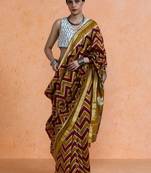 Maroon woven design saree with blouse