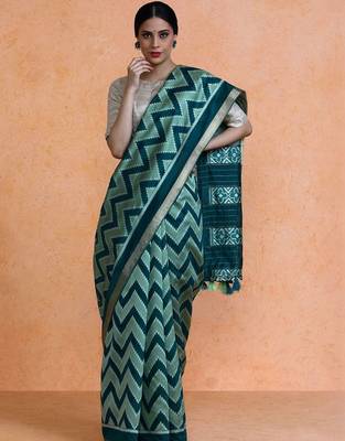 Green woven design saree with blouse 1