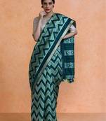Green woven design saree with blouse