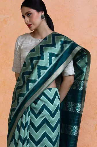 Green woven design saree with blouse