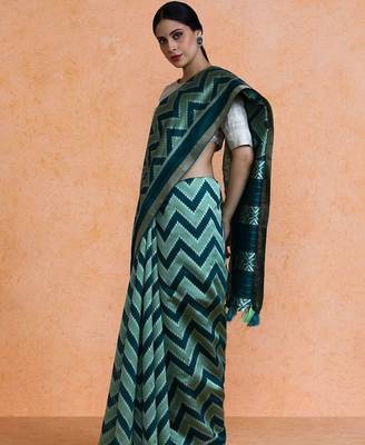 Green woven design saree with blouse 3