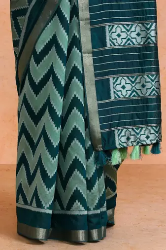Green woven design saree with blouse