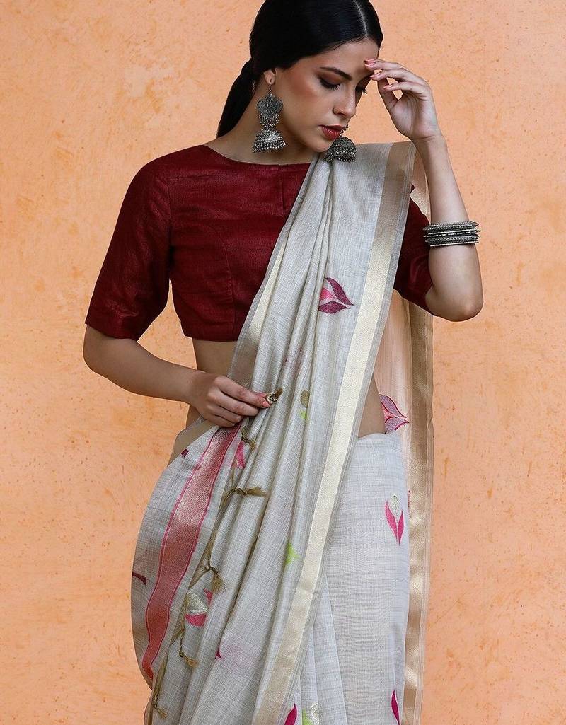 Grey woven design muga sarees with blouse piece