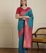 Blue ethnic motifs woven design zari kanjeevaram saree