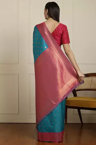 Blue ethnic motifs woven design zari kanjeevaram saree