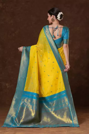 Yellow ethnic motifs woven design zari saree with unstitched blouse