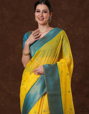 Yellow ethnic motifs woven design zari saree with unstitched blouse 4