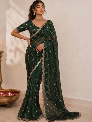 Green embroidered satin saree 1